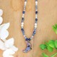 Moon necklace full of stones with forget-me-nots