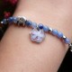 Bracelet with forget-me-not and elephant