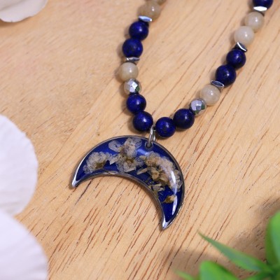 Lunula necklace with wildflowers