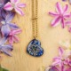 Classic heart necklace with wild carrot flower