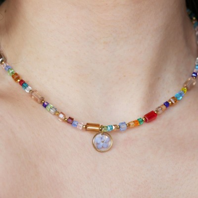 Necklace full of stones with forget-me-not
