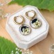 Classic earrings with pansy