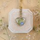 Classic heart necklace with a bouquet of flowers