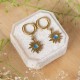 Decorative flower earrings with wild carrot flower