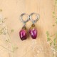 Earrings with embedded rose buds