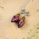 Earrings with embedded rose buds