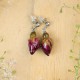 Earrings with embedded rose buds