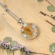 Classic dimensional necklace with a wildflower